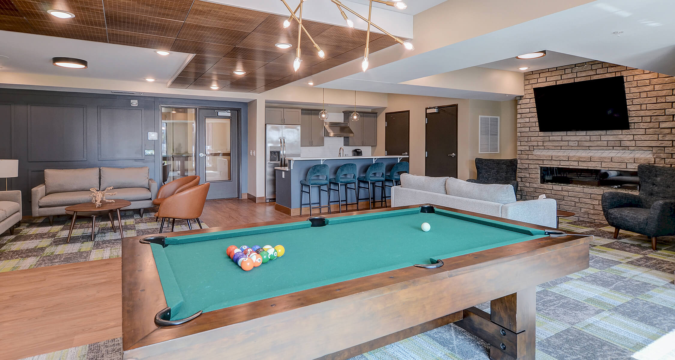 an apartment living room and kitchen