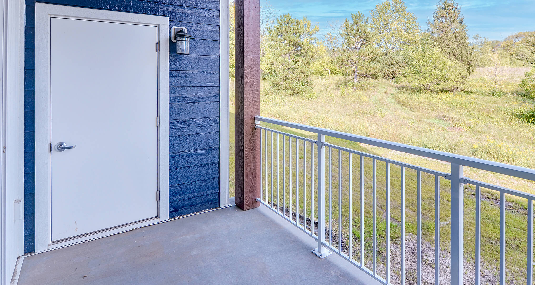 a man snuggling with a cat