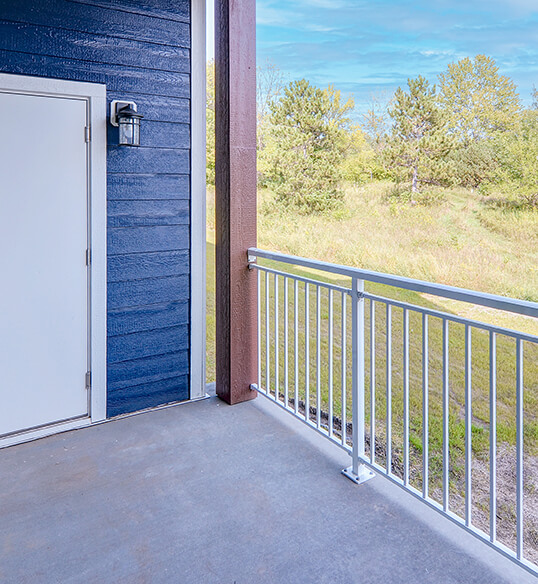 a man snuggling with a cat