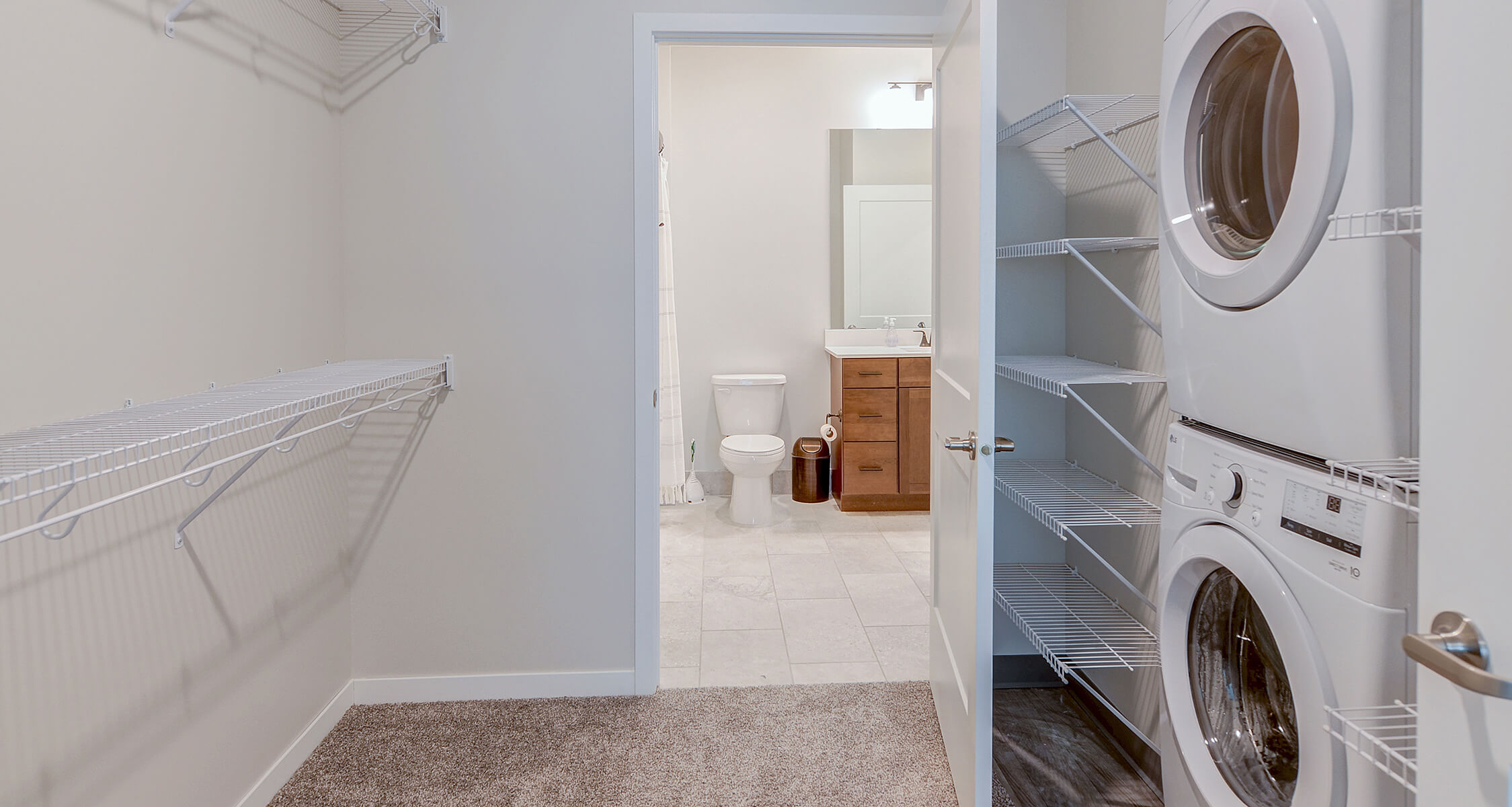 a young woman in shades holding her phone and coffee smiling