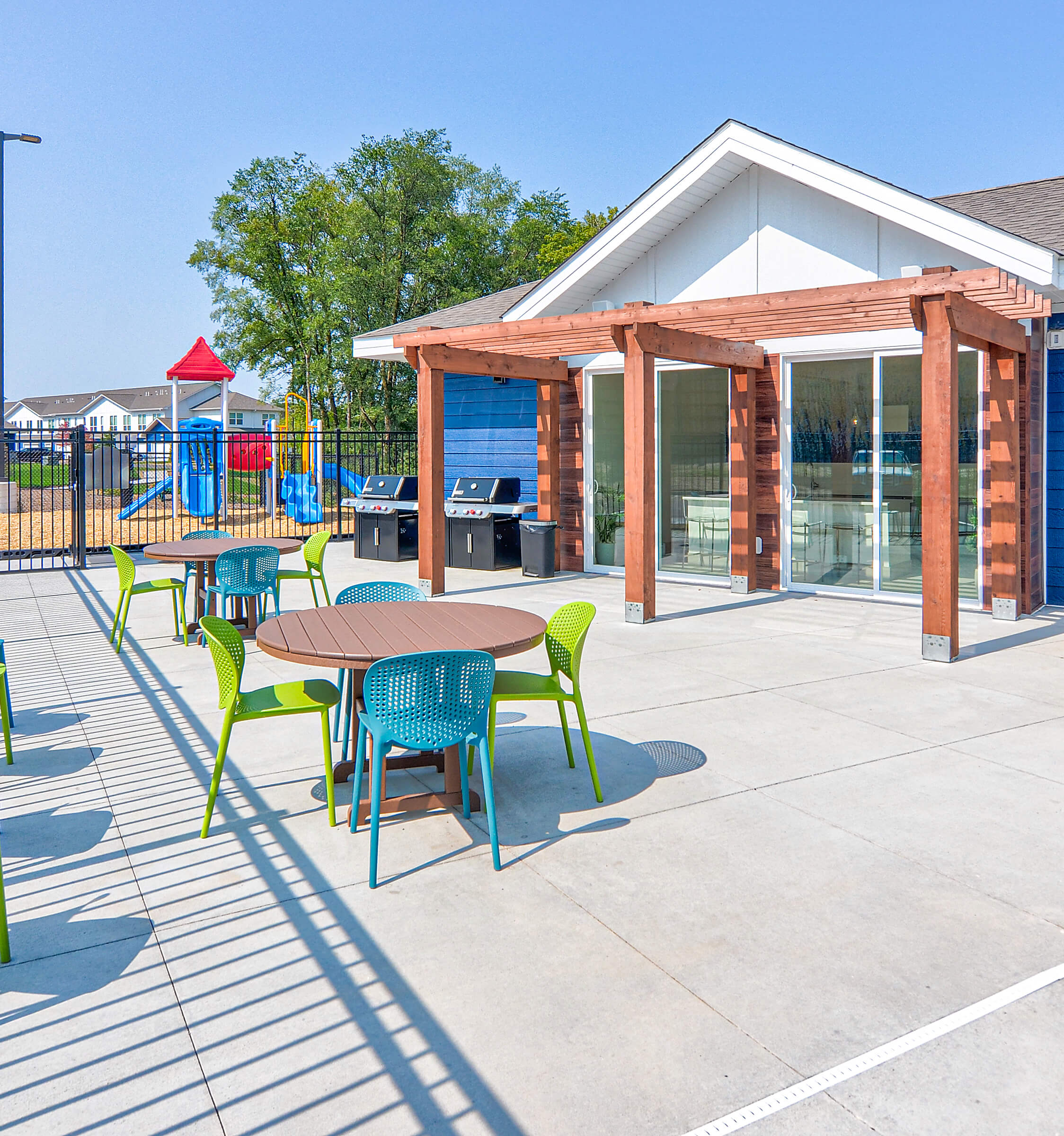 patio with playground behind it